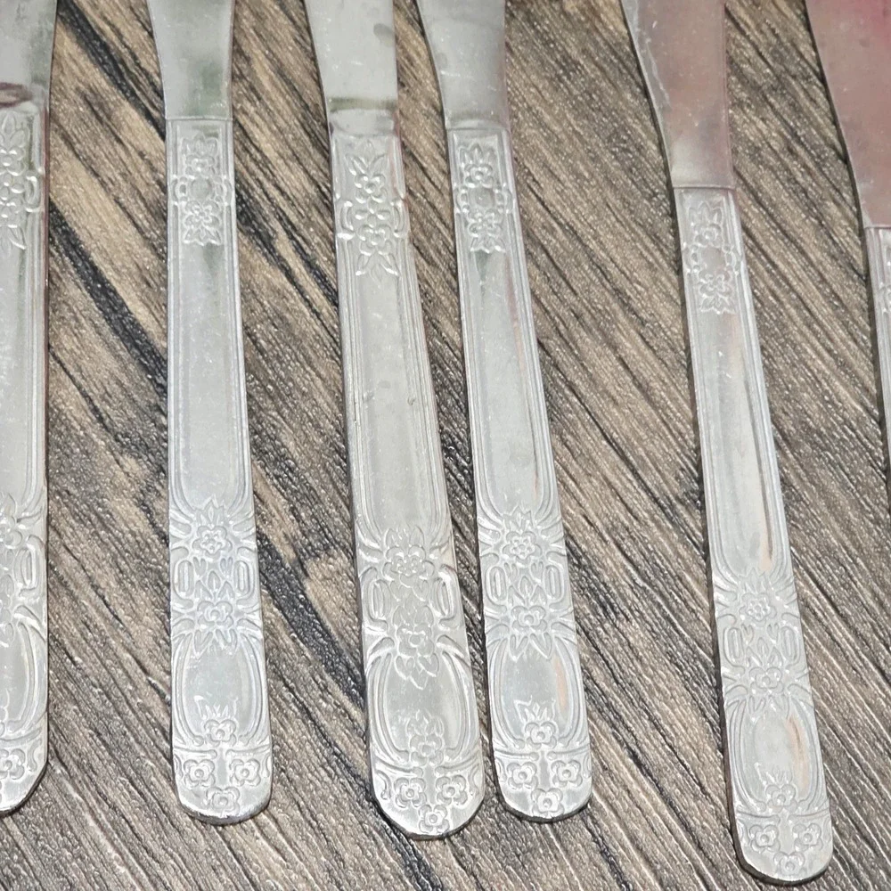 Set of 7 Stainless China Butter Knives Serrated Edge Floral Handle‎ Cutlery VTG